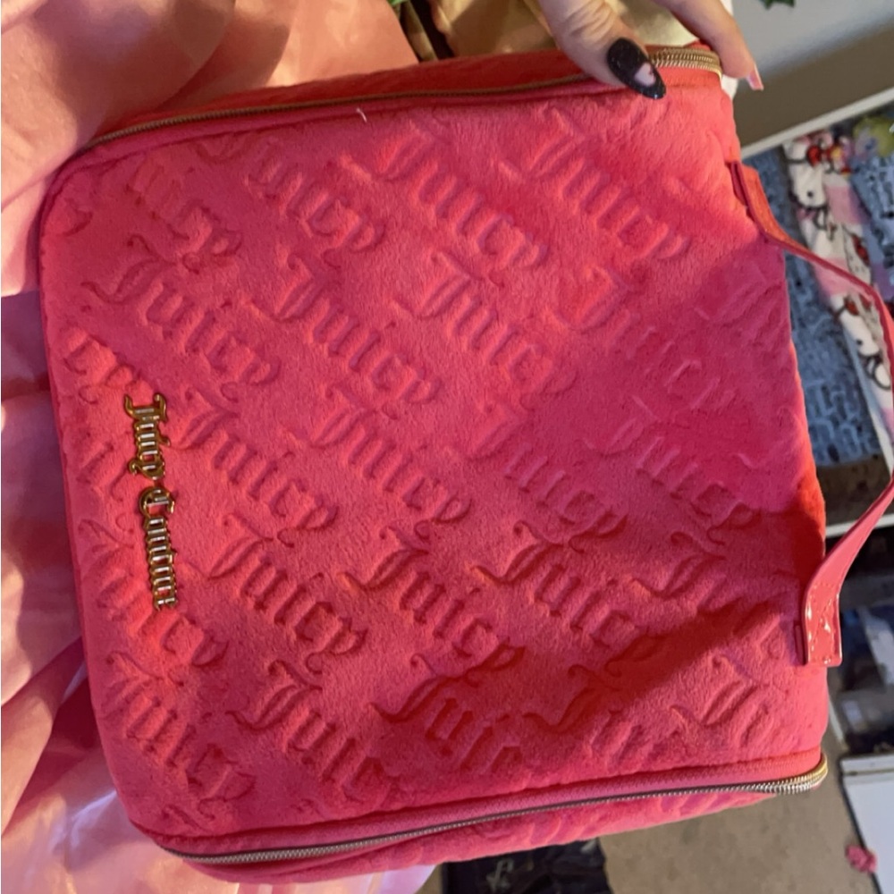 Juicy couture trending makeup bag.